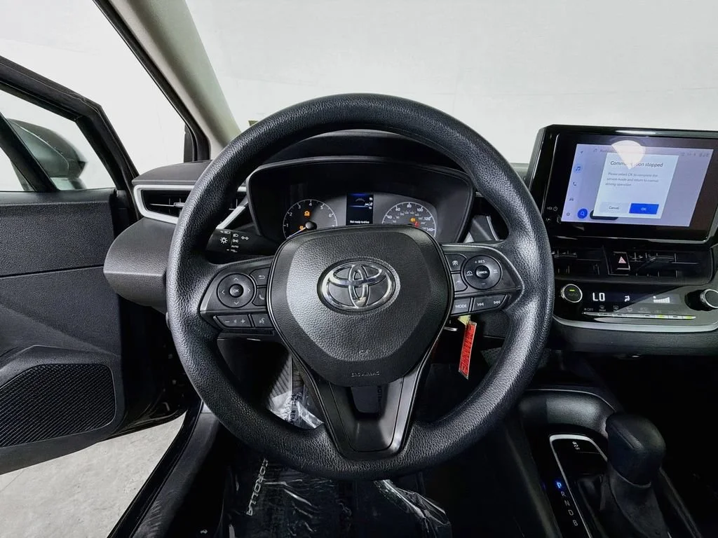 Used 2024 Black Toyota LE image 13