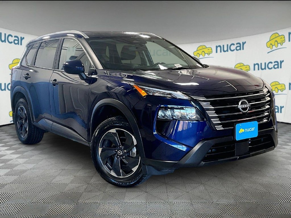 Used 2024 Blue Nissan SV image 1