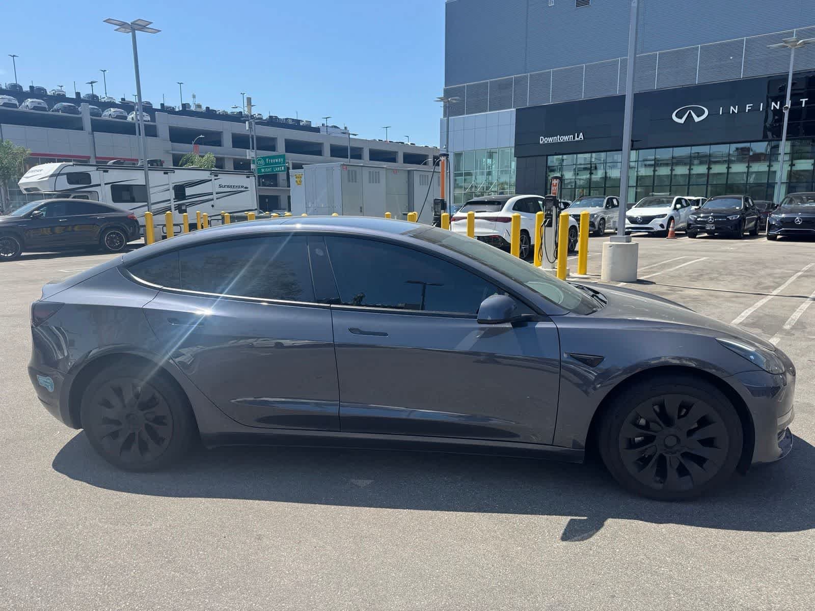 Used 2022 Solid Black Tesla Long Range image 4