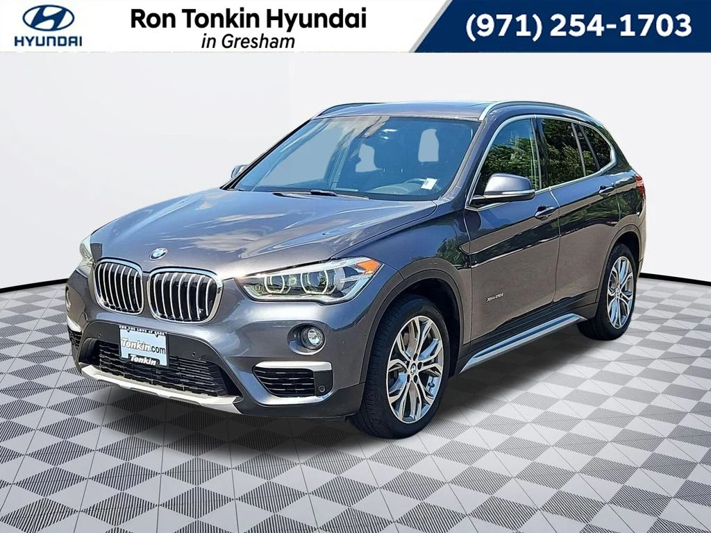 Used 2017 Mineral Gray Metallic BMW xDrive28i image 1