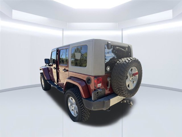 Used 2010 Red Jeep Unlimited Sahara image 8