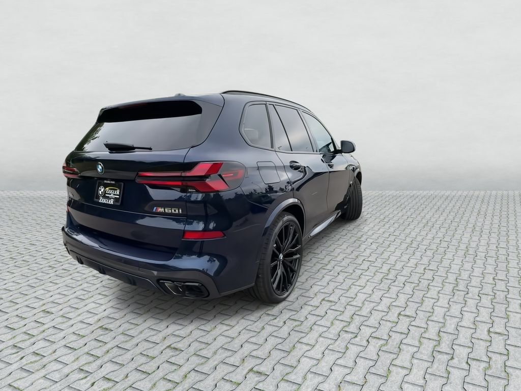 New 2026 Tanzanite Blue II Metallic BMW M60i image 8