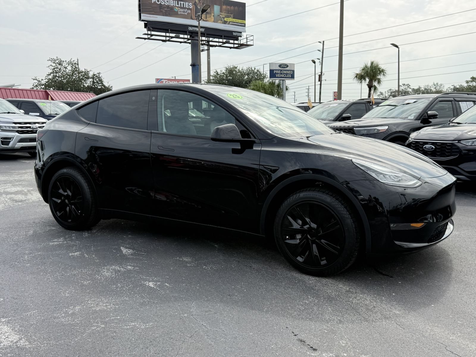 Used 2023 Tesla Model Y Long Range with VIN 7SAYGDEE5PA057090 for sale in Spring Hill, FL