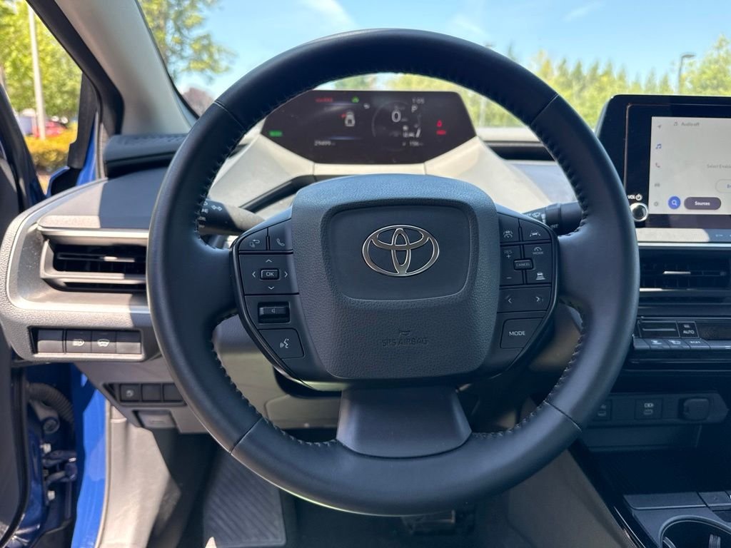 Used 2025 Reservoir Blue Toyota LE image 10