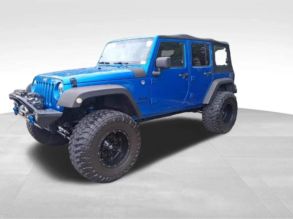 Used 2015 Blue Jeep Unlimited Sport image 16