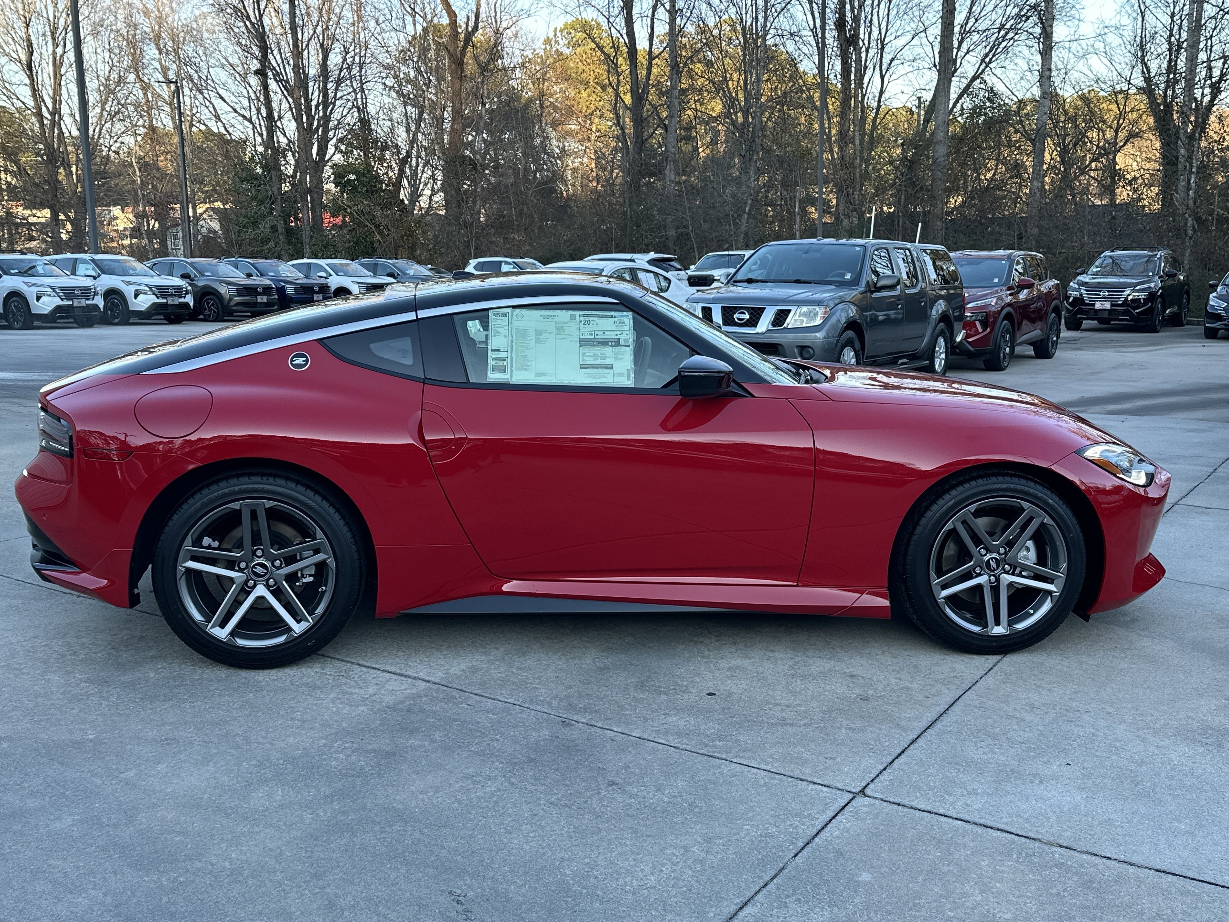New 2026 Solid Red/Super Black Nissan Sport image 9