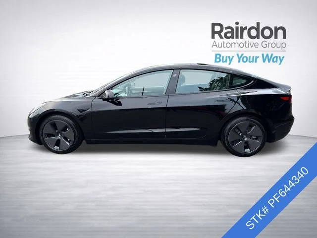 Used 2023 Solid Black Tesla Base image 4