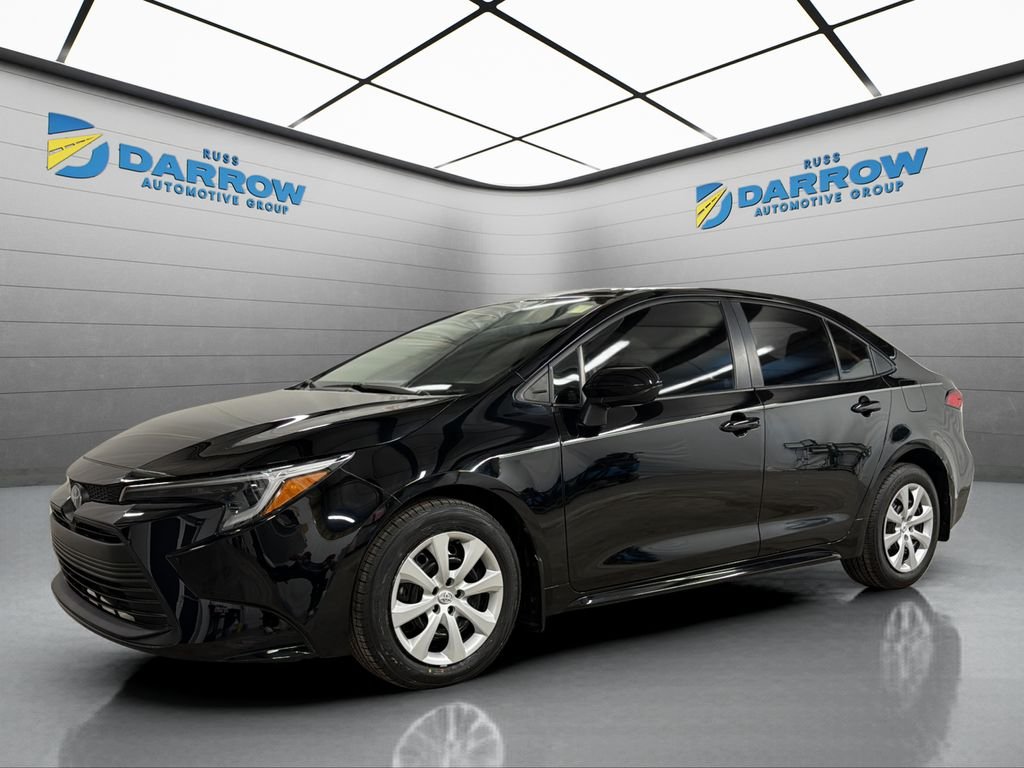Used 2025 Black Toyota LE image 1