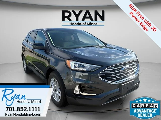 Used 2022 Blue Metallic Ford SEL image 1