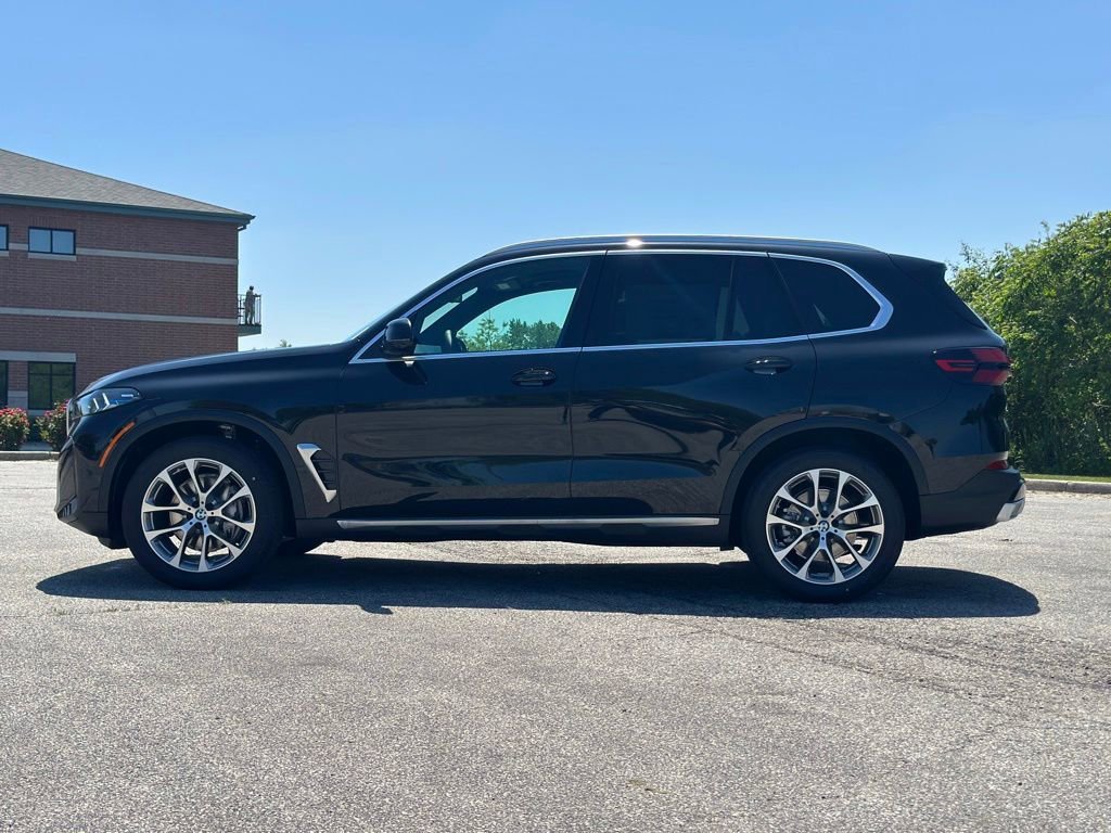 New 2026 Black Sapphire Metallic BMW xDrive40i image 4