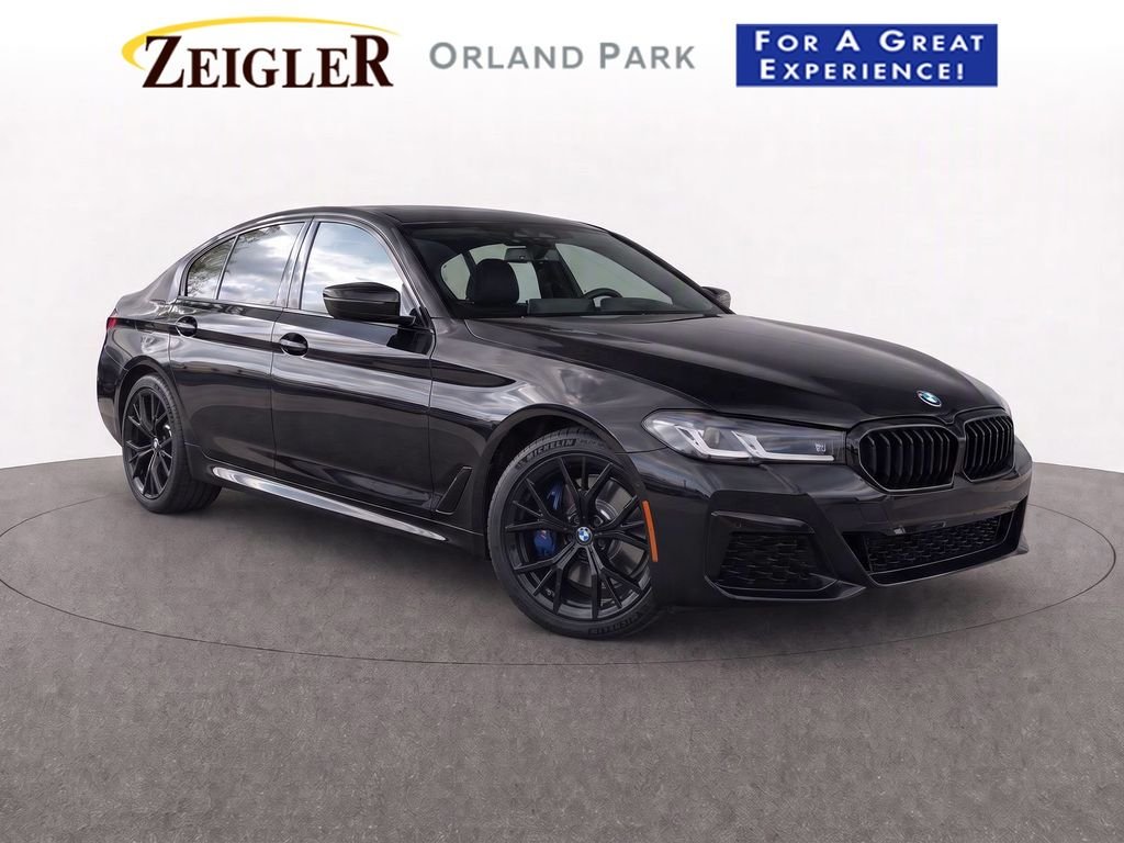 Certified Used 2023 Carbon Black Metallic BMW 530i xDrive image 1