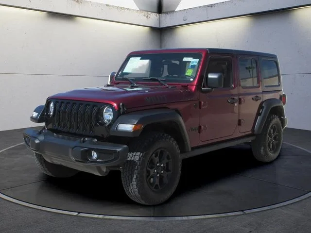Used 2021 Snazzberry Pearlcoat Jeep Unlimited Willys image 1