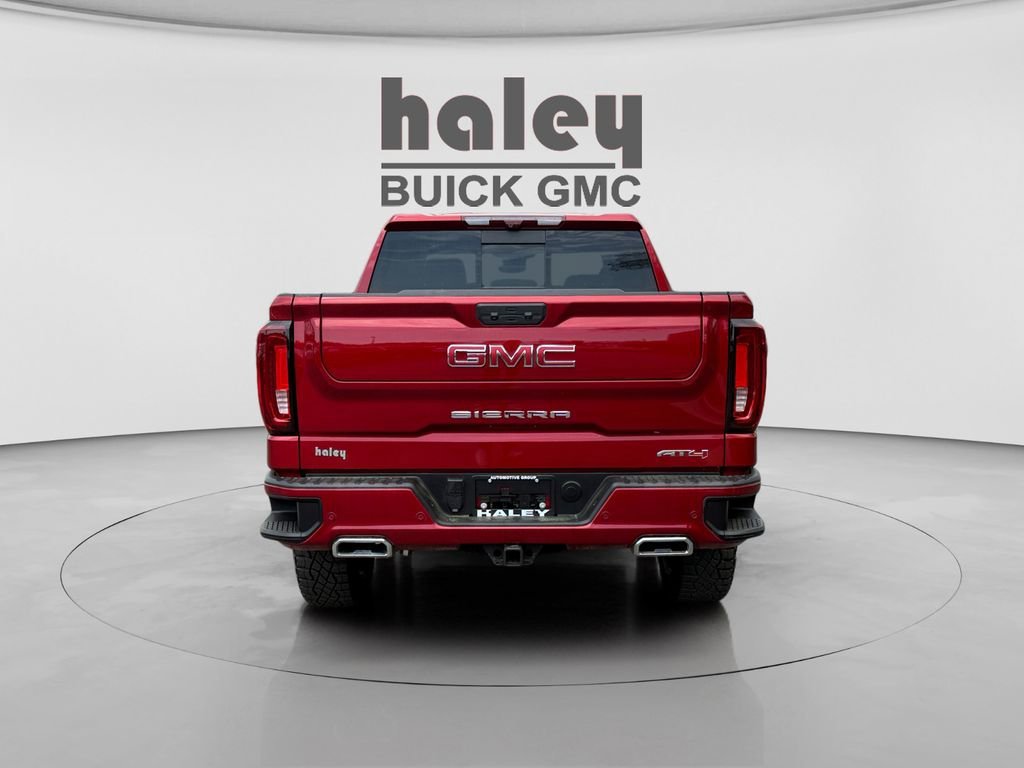 Used 2024 Volcanic Red Tintcoat GMC AT4 image 4