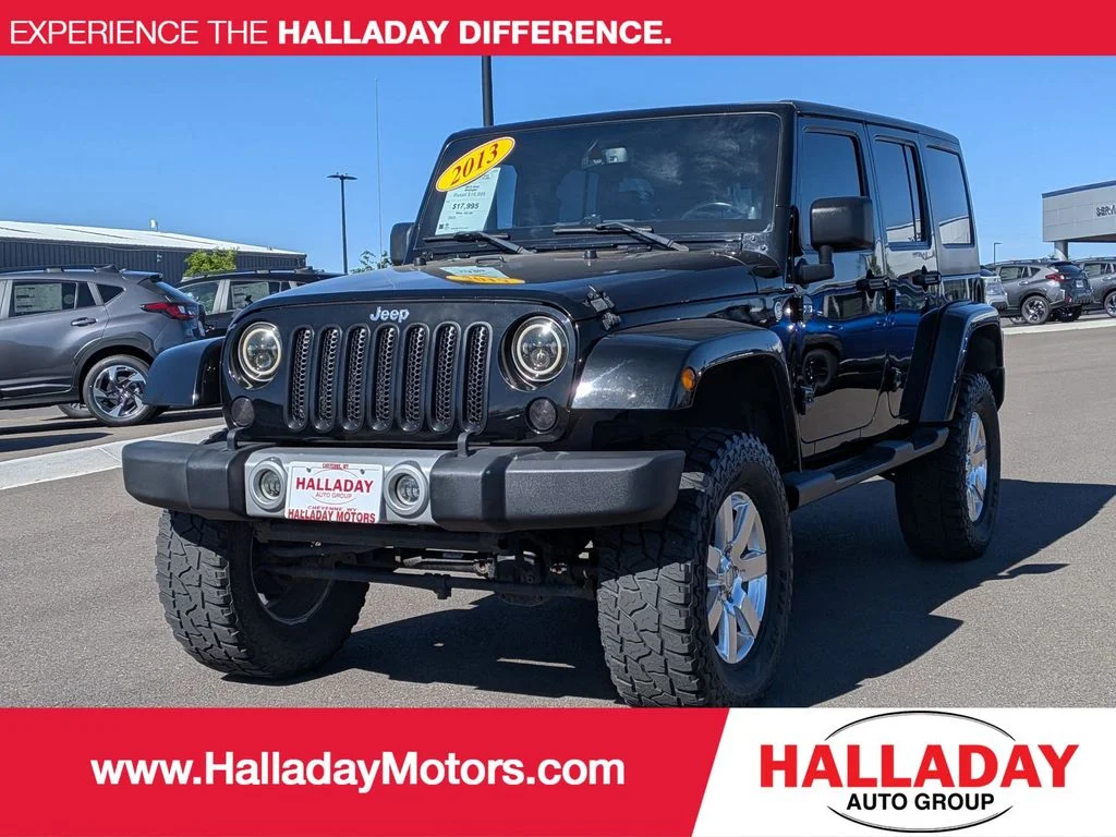 Used 2013 Black Jeep Sahara image 1
