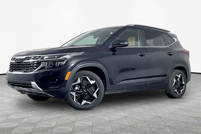 Used 2024 Black Kia EX image 1