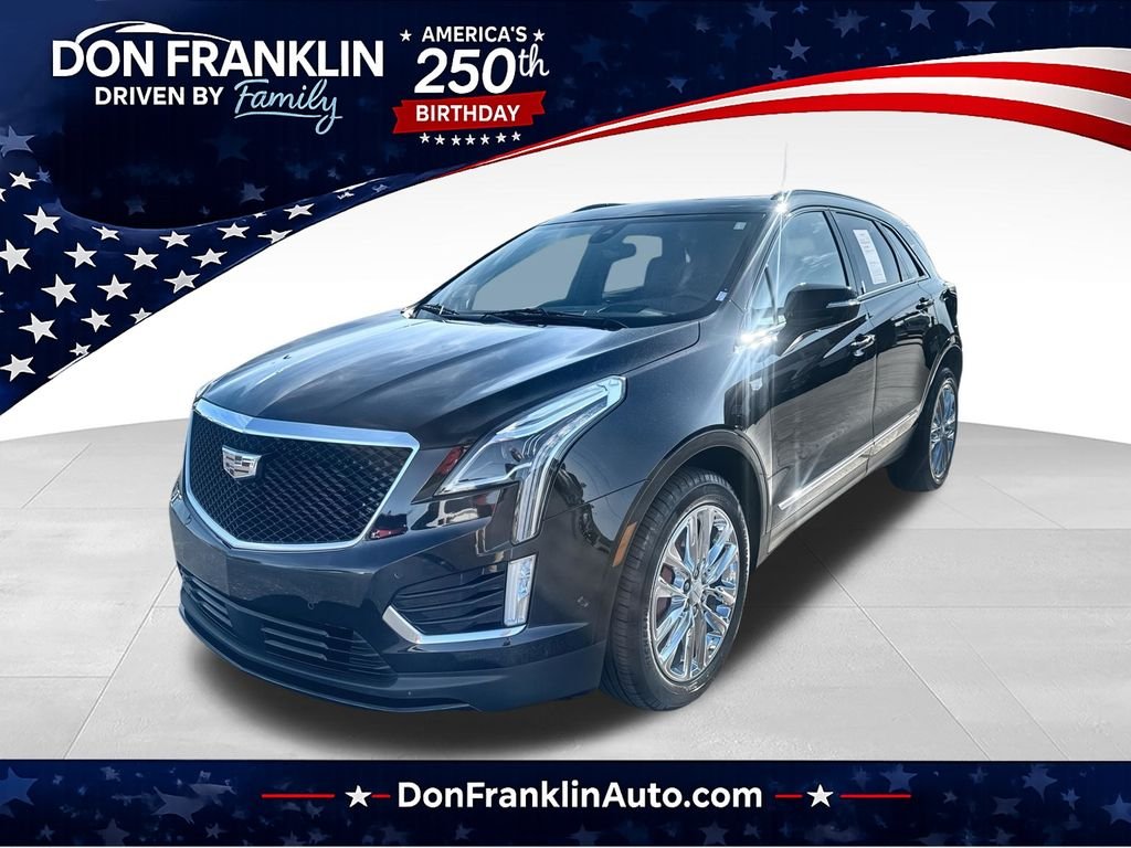 Used 2023 Black Cadillac Sport image 1