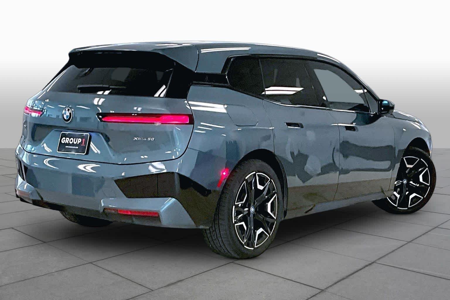 Used 2024 Blue Ridge Mountain Metallic BMW xDrive50 image 12