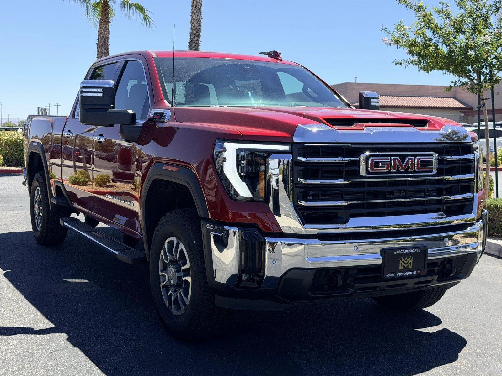 New 2026 Volcanic Red Tintcoat GMC SLT image 1