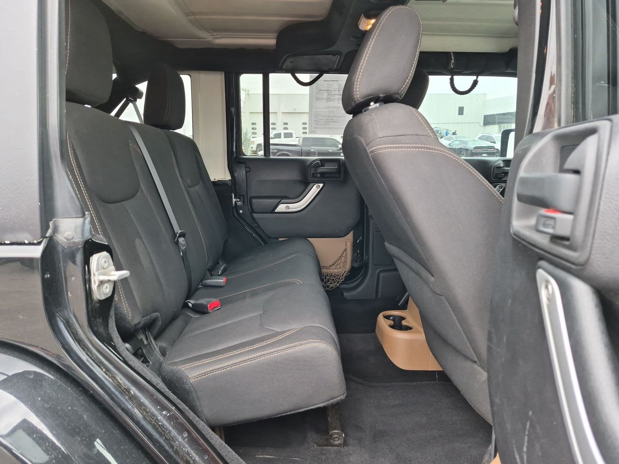 Used 2015 Black Clearcoat Jeep Sahara image 18