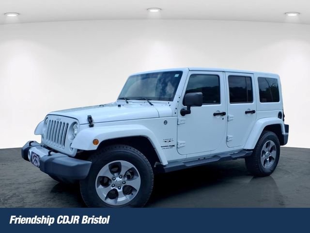 Used 2018 White Jeep Unlimited Sahara image 1