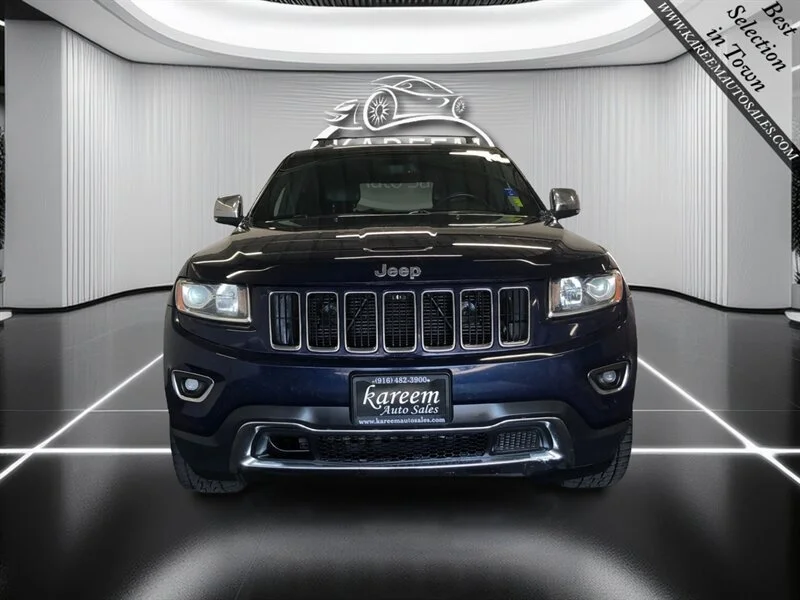 Used 2014 True Blue Pearlcoat Jeep Limited image 2