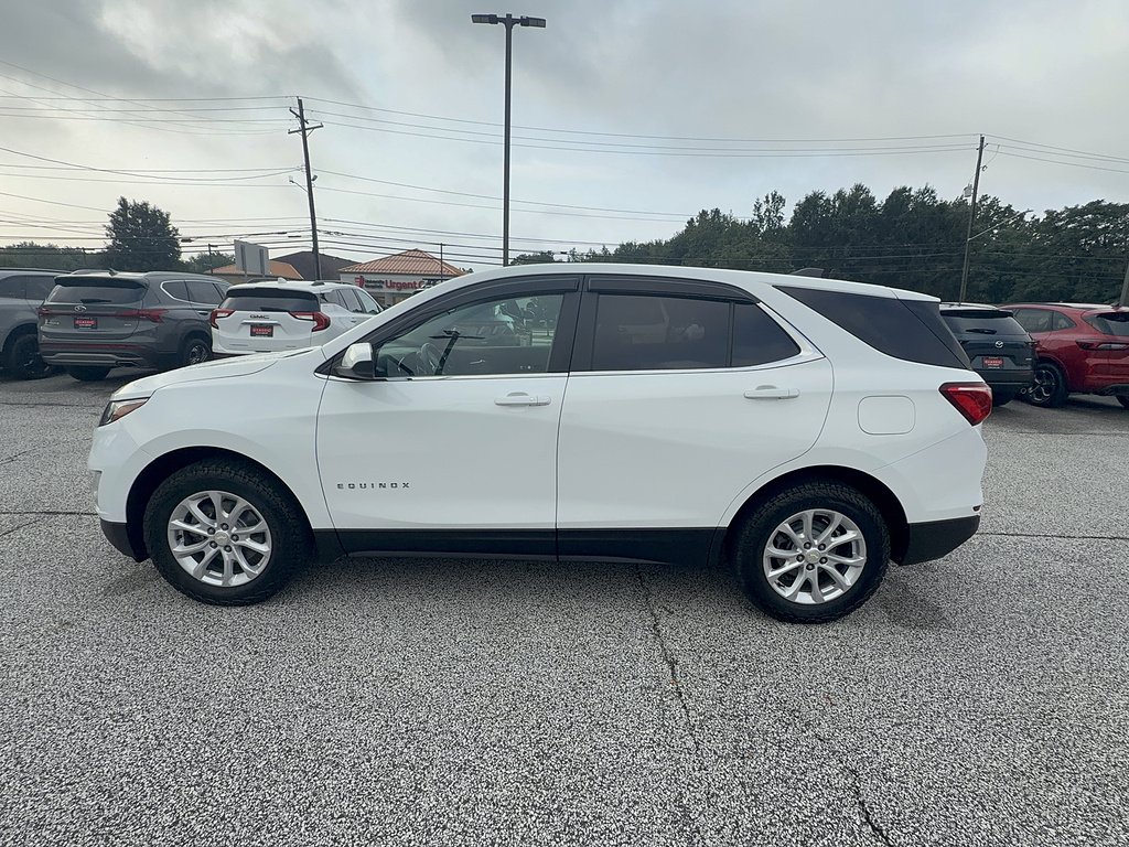 Used 2021 Chevrolet Equinox LT with VIN 3GNAXUEV0MS162714 for sale in Madison, OH