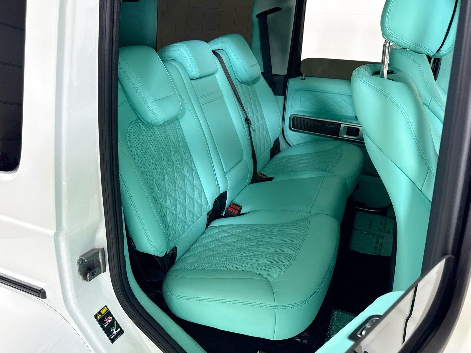 Used 2024 Polar White Mercedes-Benz AMG® G 63  Brabus Custom Widebody / Custom Tiffany Interior image 26
