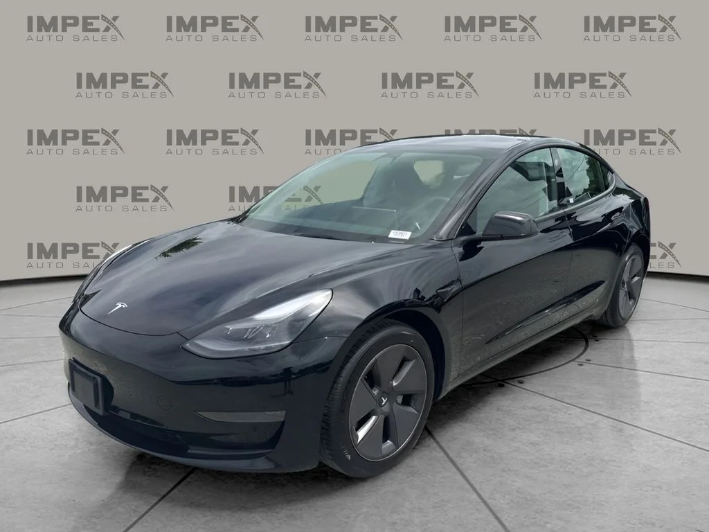 Used 2023 Black Tesla Base image 1