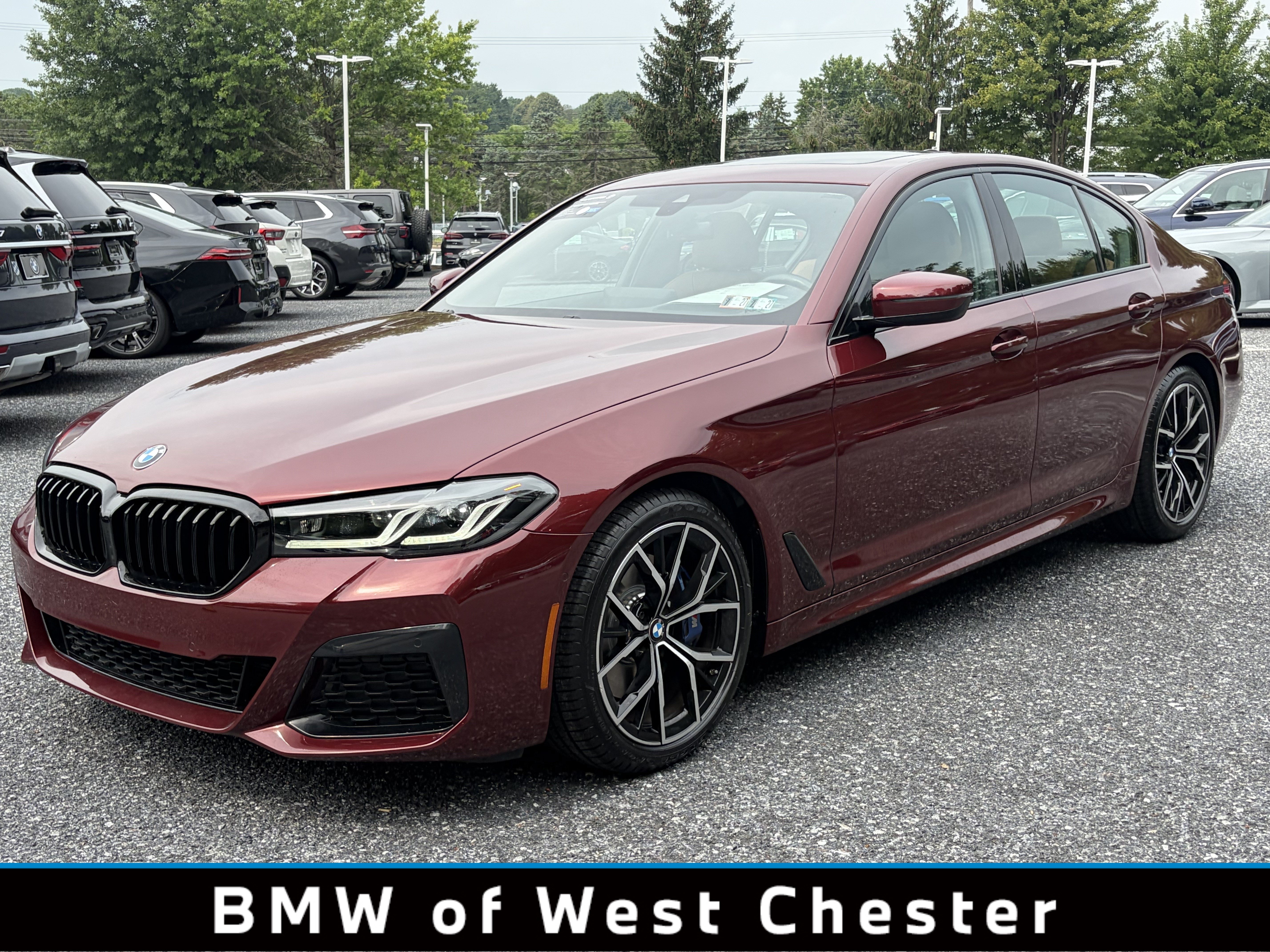 Used 2023 AVENTURIN RED MET BMW 530i xDrive image 1