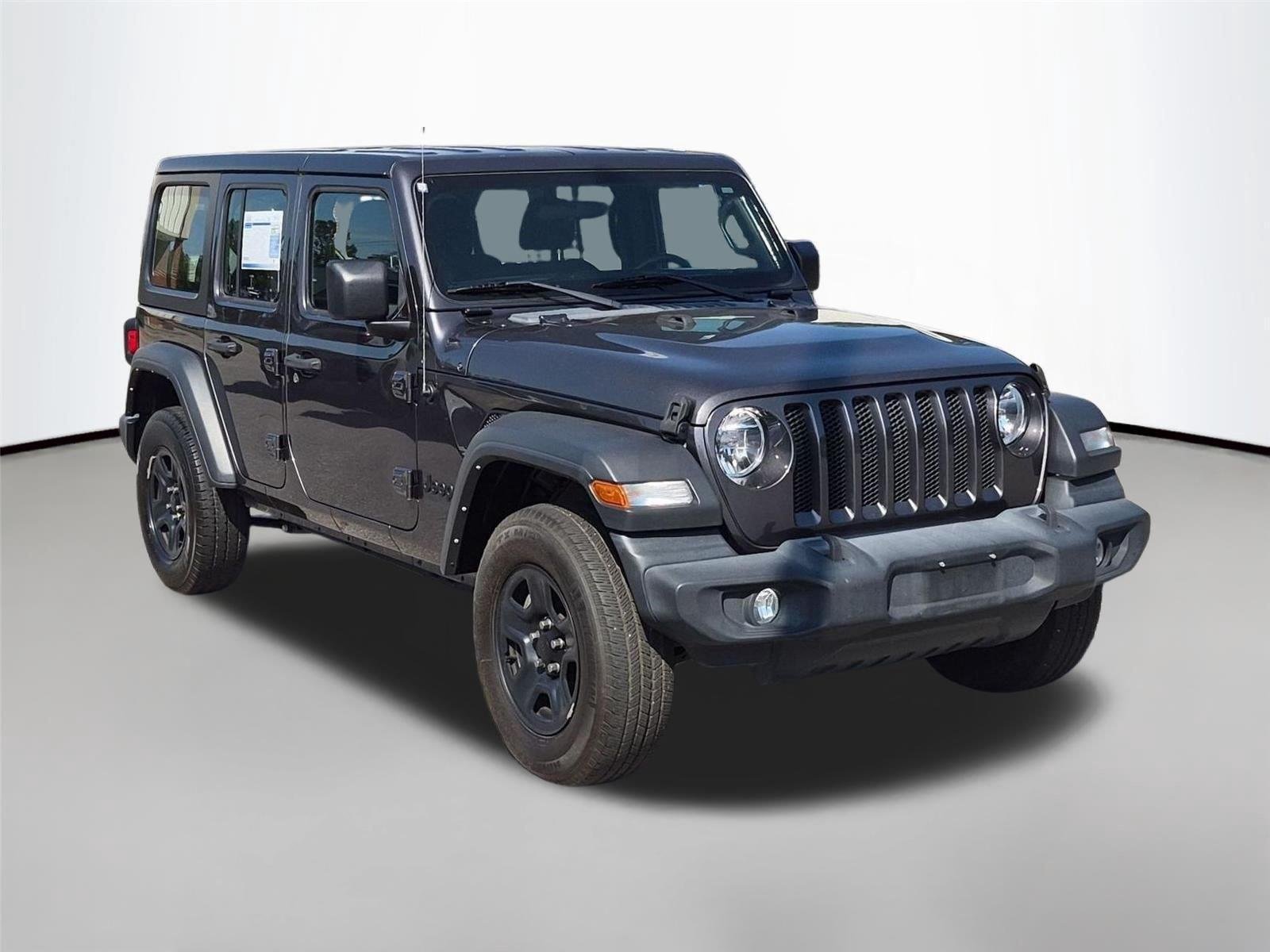 Used 2022 Granite Crystal Metallic Clearcoat Jeep Unlimited Sport image 7