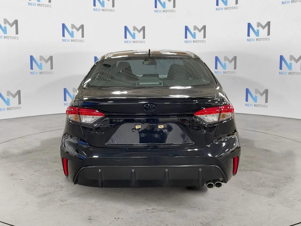 Used 2025 Midnight Black Metallic Toyota SE image 4
