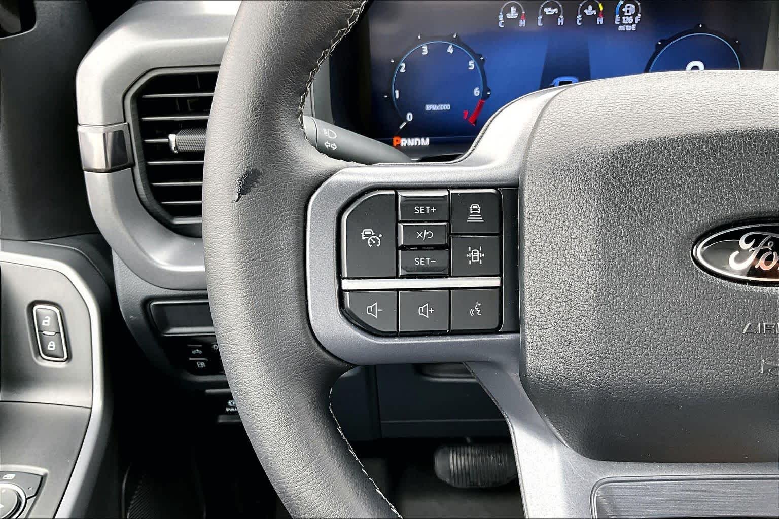 Used 2025 Agate Black Metallic Ford XLT image 24