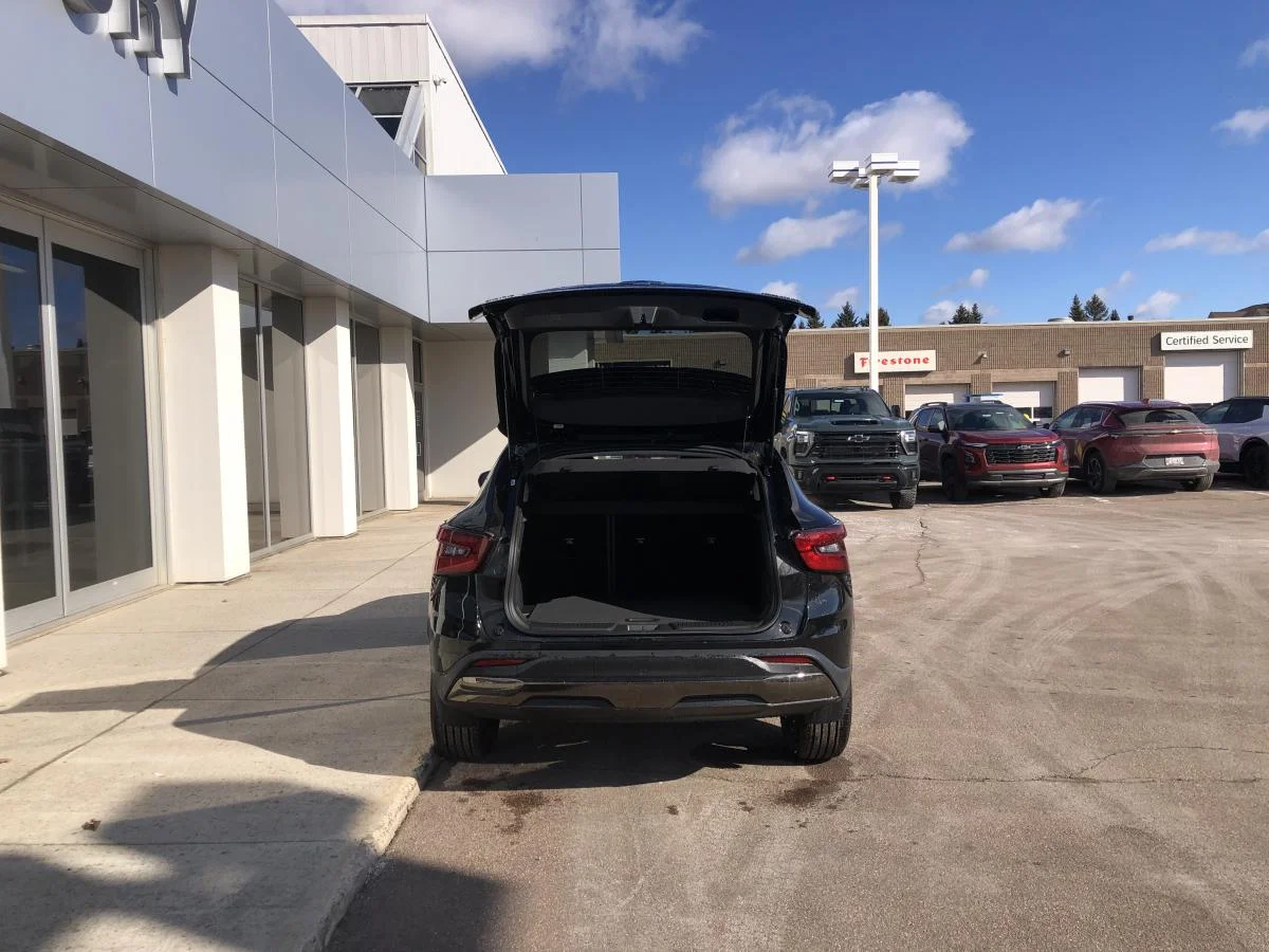 New 2026 Black Chevrolet Fwd 4dr Activ image 7
