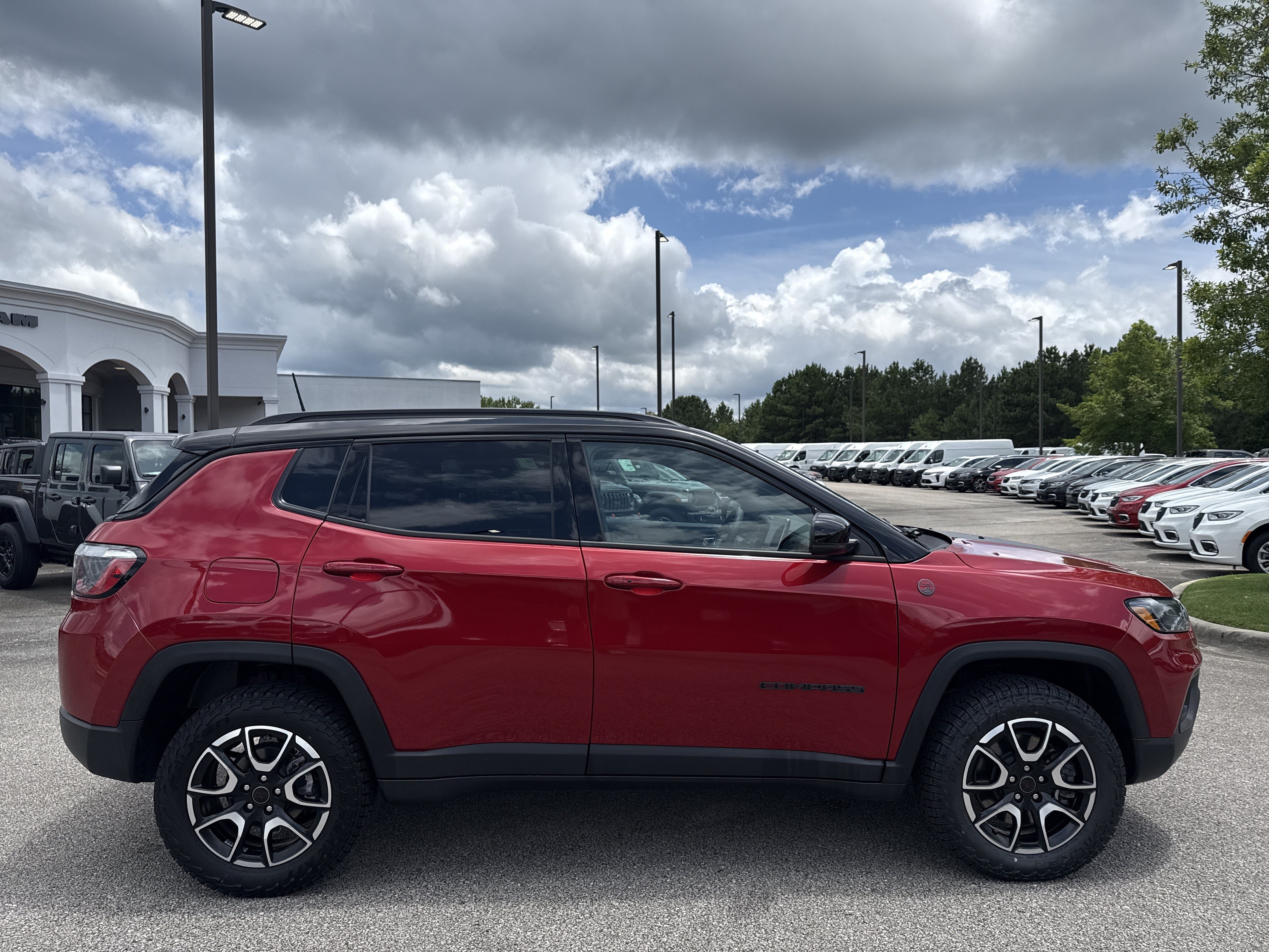 Used 2025 Red Hot Pearlcoat Jeep Trailhawk image 2
