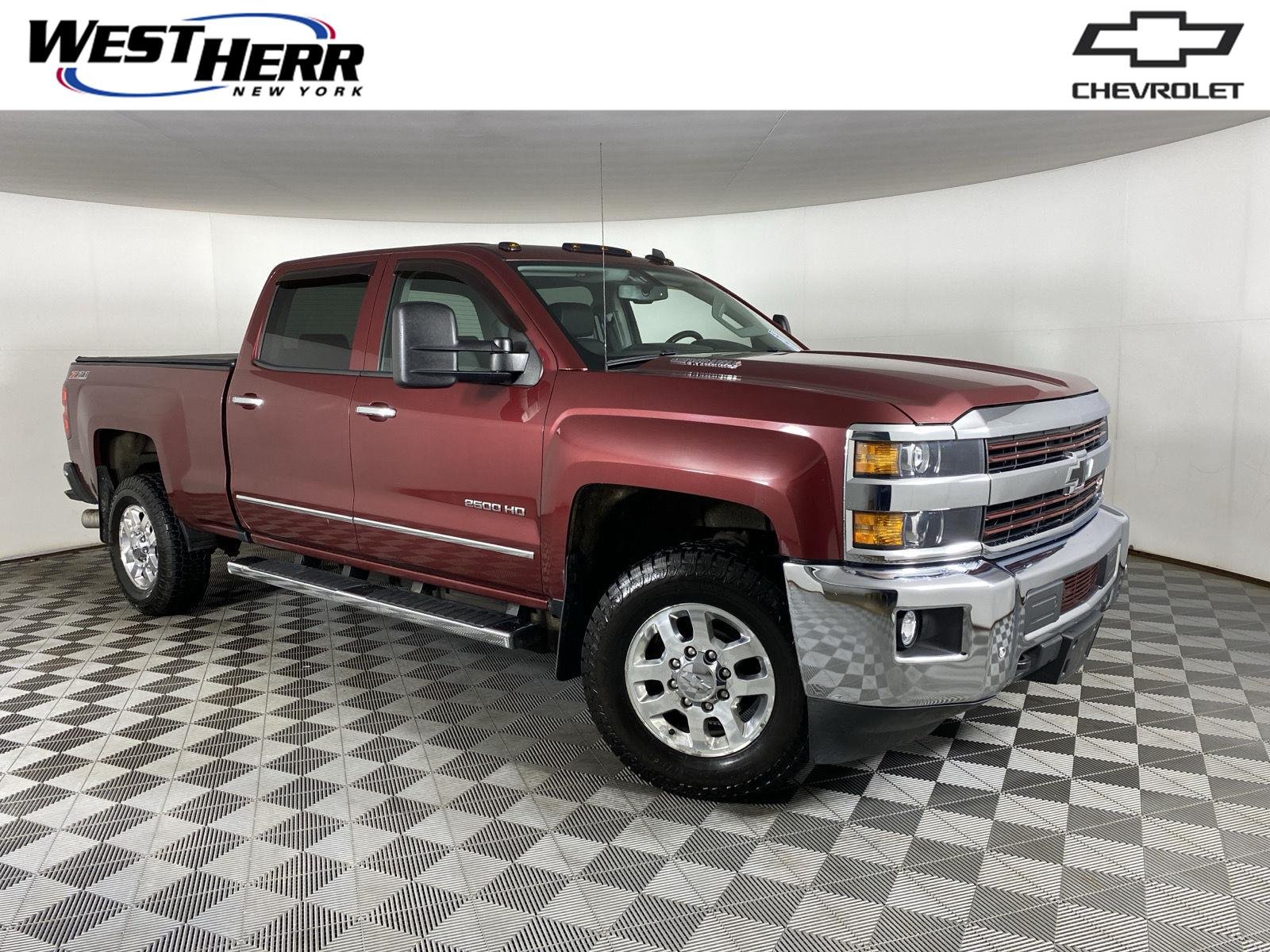 Used 2015 Deep Ruby Metallic Chevrolet LTZ image 1