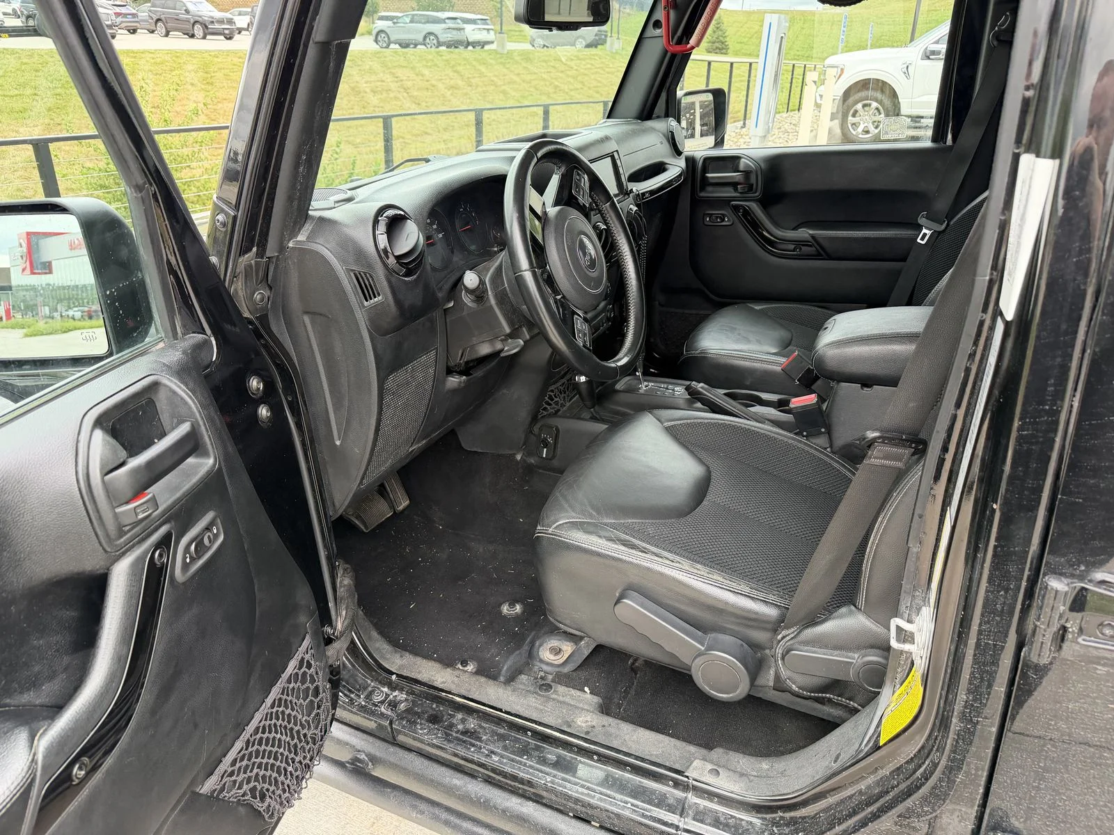Used 2017 Black Jeep Unlimited Sahara image 5