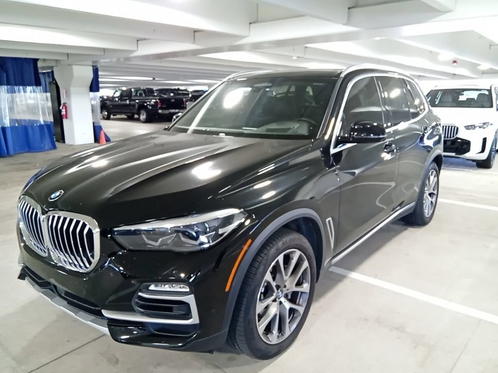 Used 2021 Jet Black BMW xDrive40i image 1