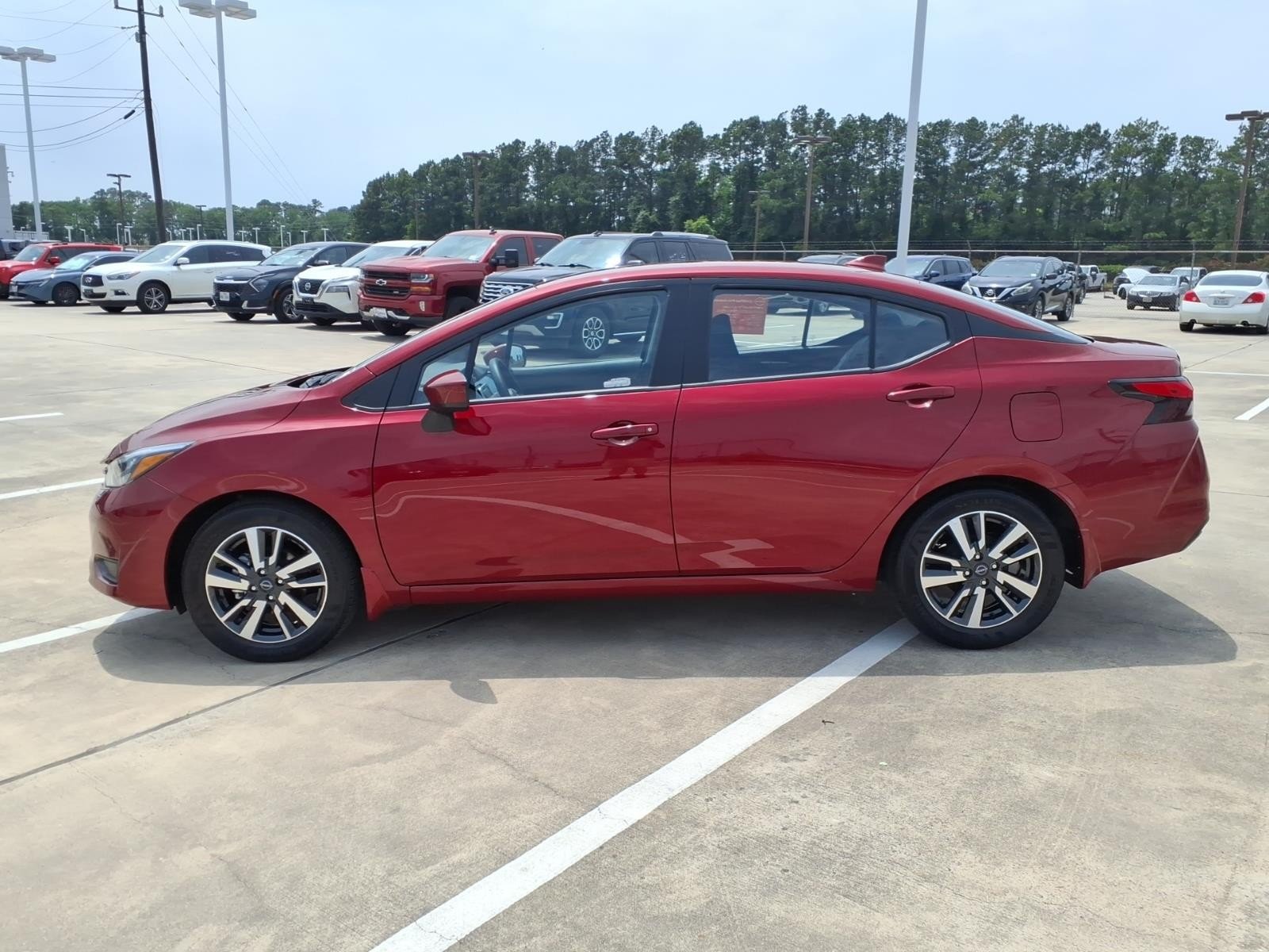2025 Nissan Versa SV Red at Robbins Nissan