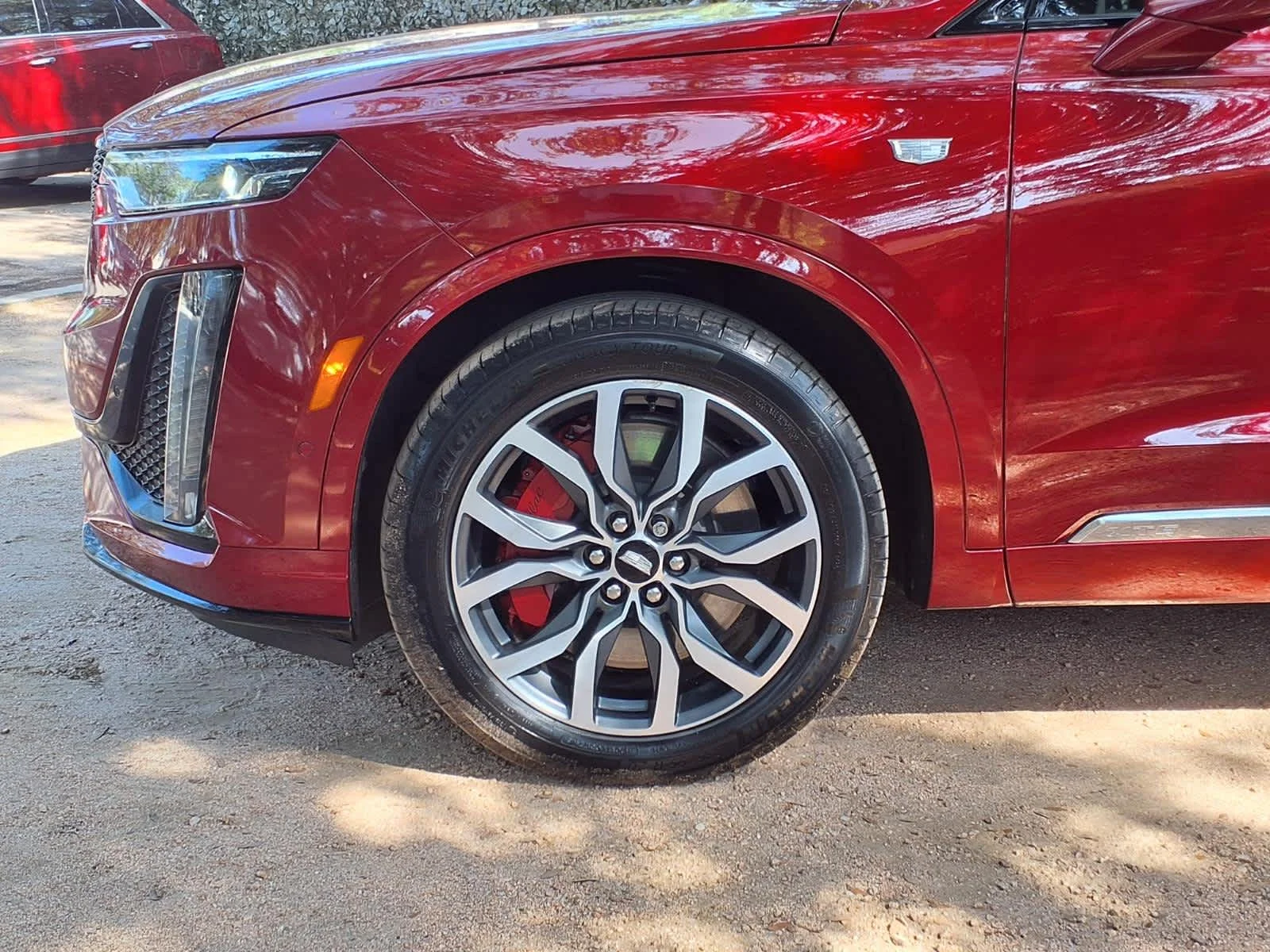 Used 2024 Radiant Red Tintcoat Cadillac Sport image 10