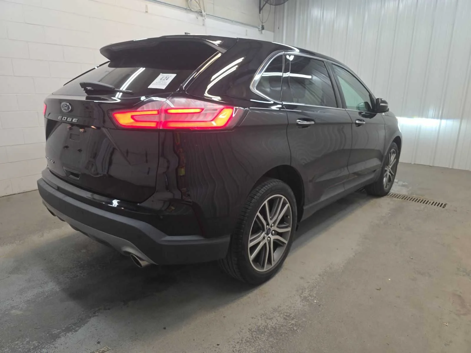 Used 2021 Agate Black Metallic Ford Titanium image 4