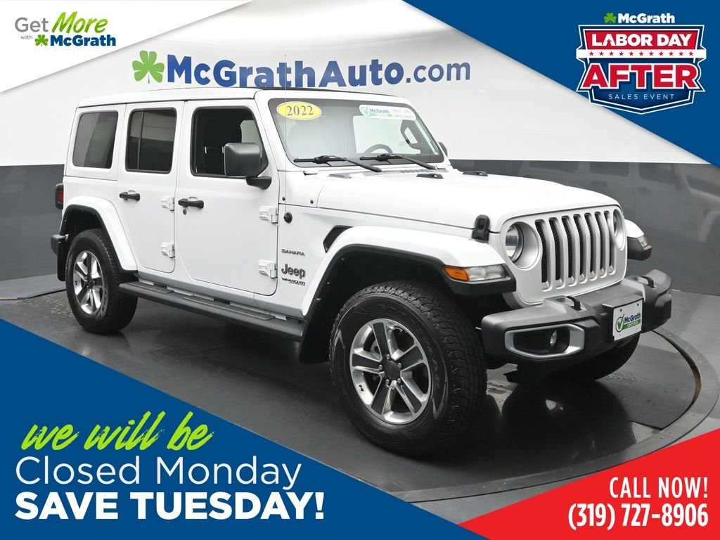 Used 2022 White Jeep Unlimited Sahara image 1