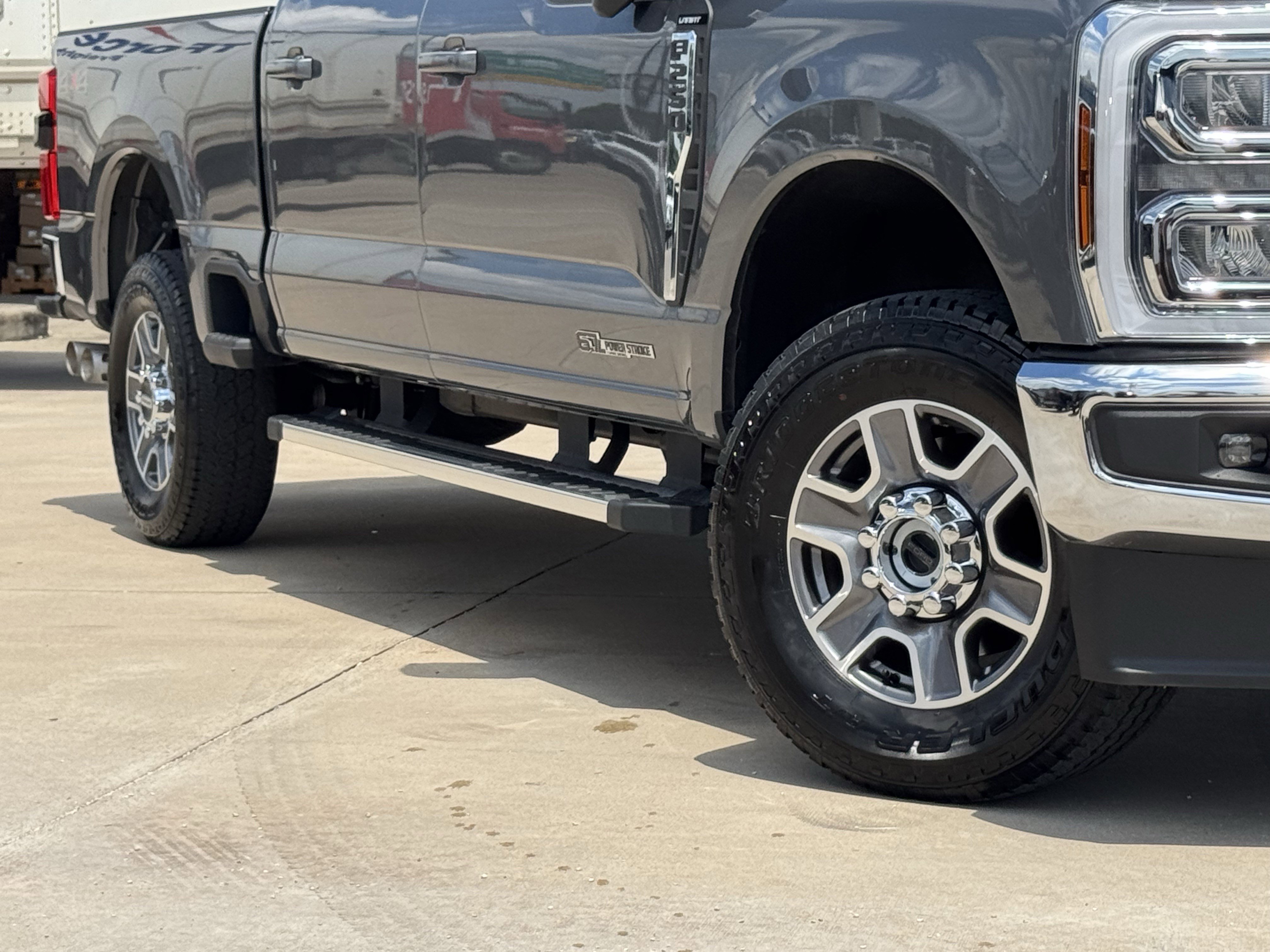 Used 2025 Gray Metallic Ford LARIAT 4WD Crew Cab 6.75