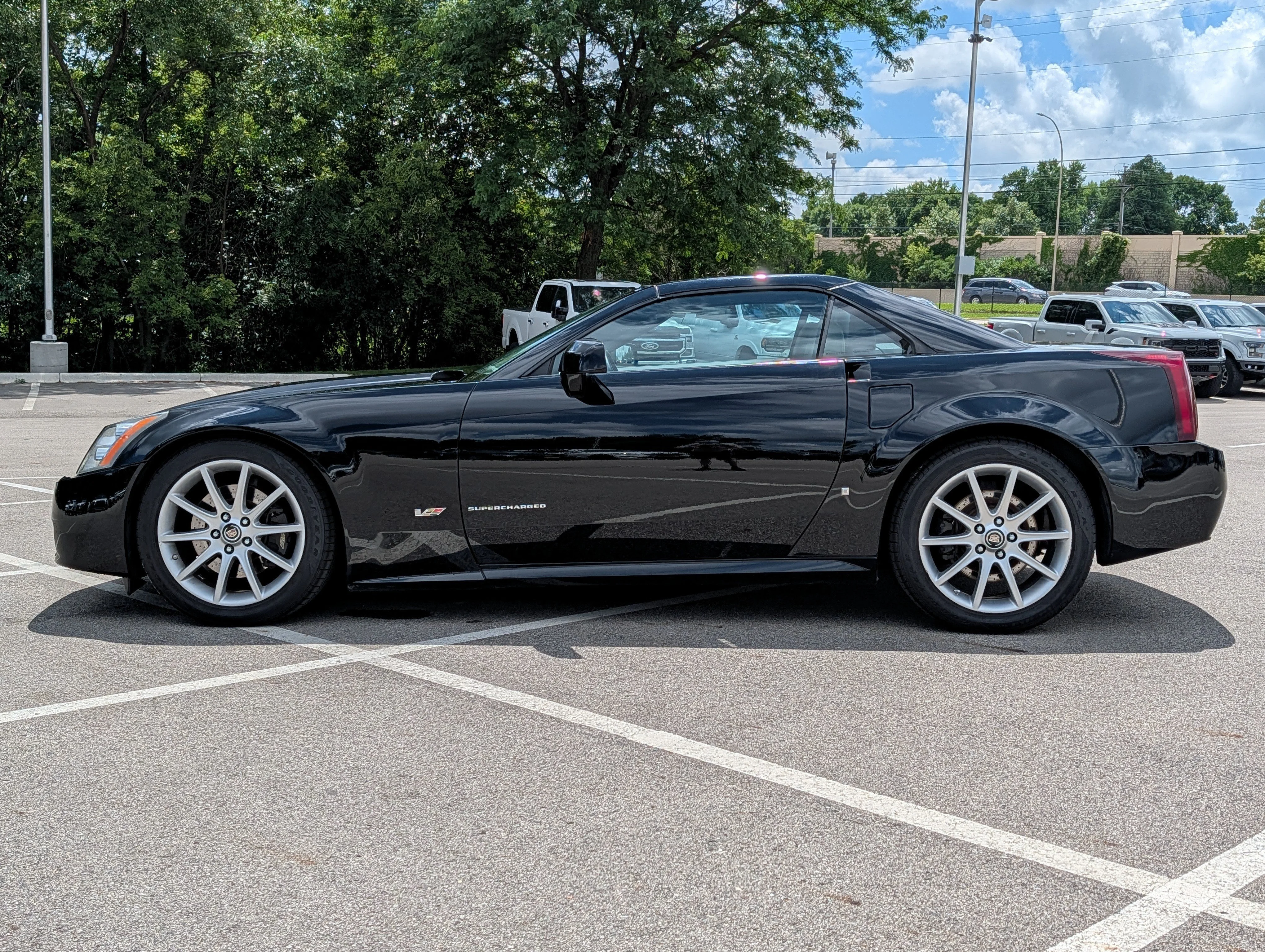 Used 2006 Black Raven Cadillac  image 29