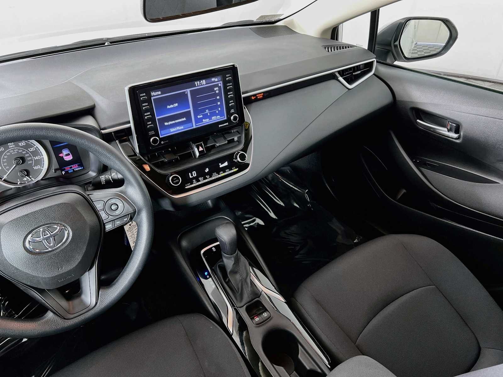Used 2021 Super White Toyota LE image 22