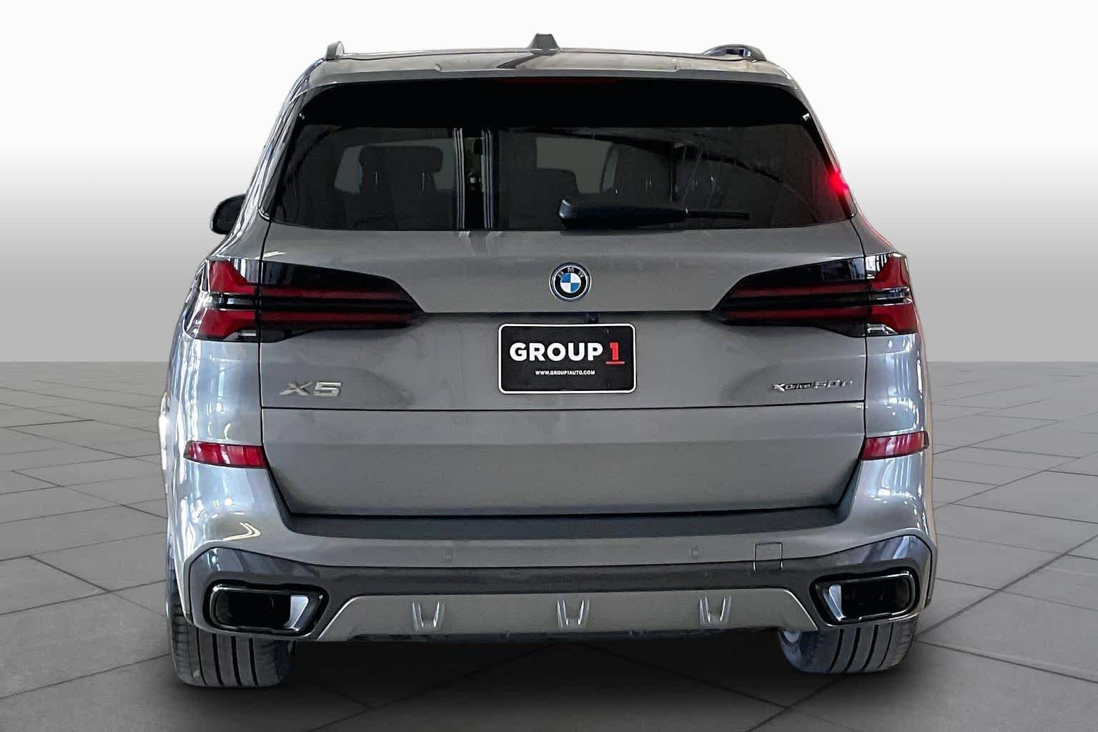 Used 2025 Skyscraper Grey Metallic BMW xDrive50e image 4