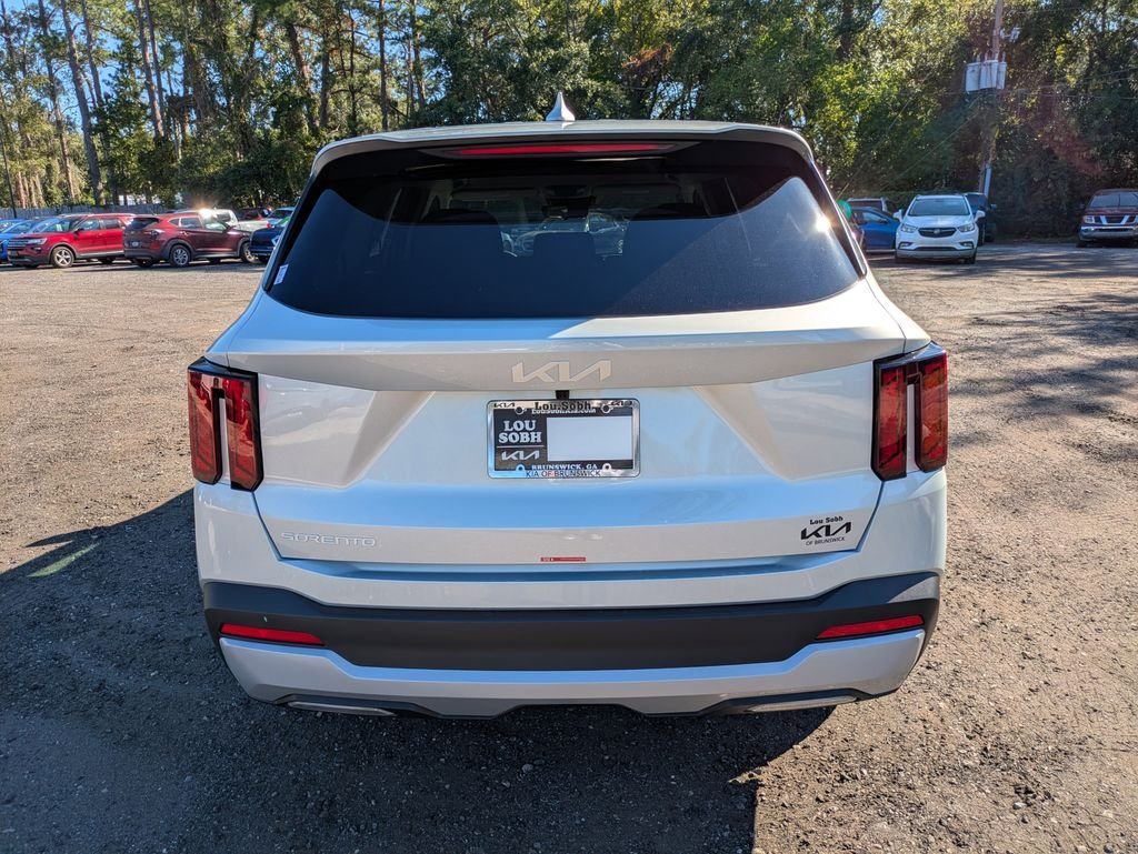 New 2026 Ivory Silver Kia LX image 4