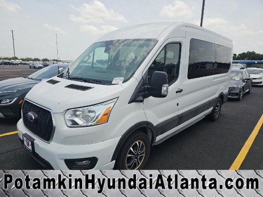 2022 Ford Transit 350 XLT Med Roof Sliding Pass. 148's photo