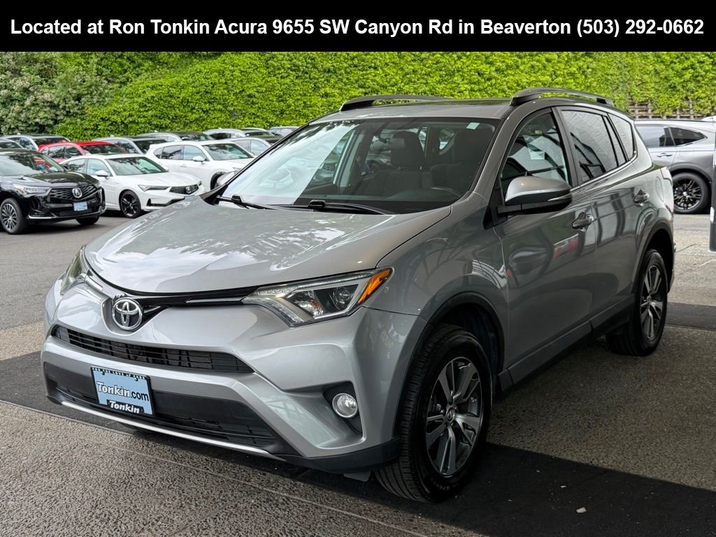 Used 2016 Silver Sky Metallic Toyota XLE image 4