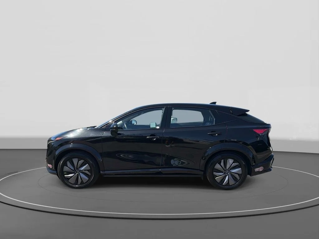 Used 2024 Black Diamond Pearl Nissan EVOLVE+ image 4