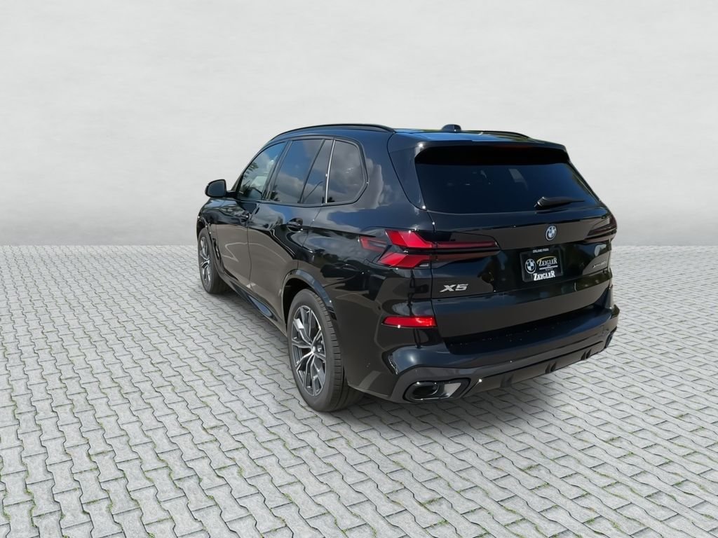 New 2026 Black Sapphire Metallic BMW xDrive50e image 7